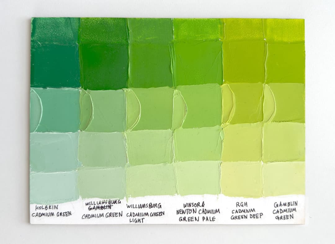 Six kinds of cadmium green are swatched out on a panel. Some are yellower green and some are bluer green.