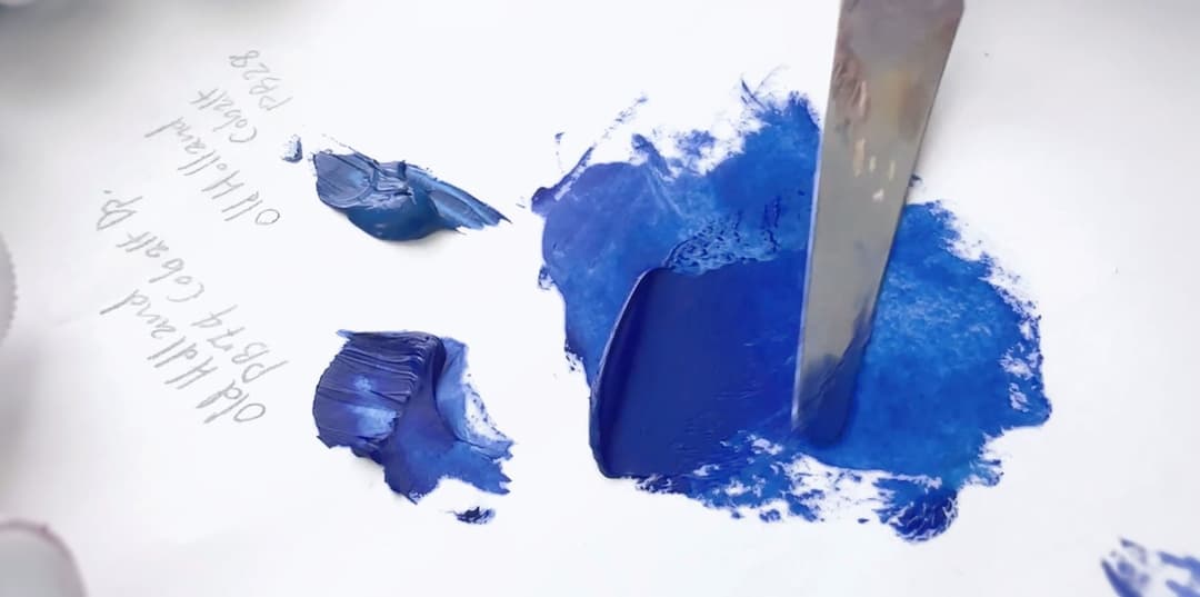 Two varieties of cobalt blue being mixed