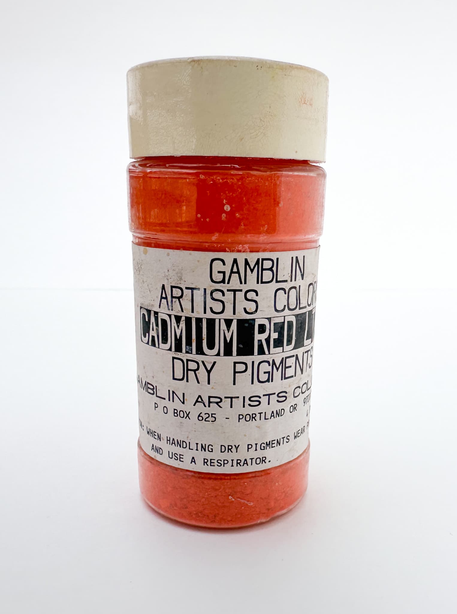 A jar of Cadmium Red Light