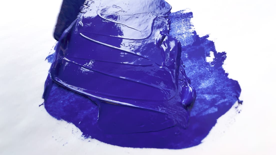 A swoosh of deep blue oil paint made with genuine YInMn Blue