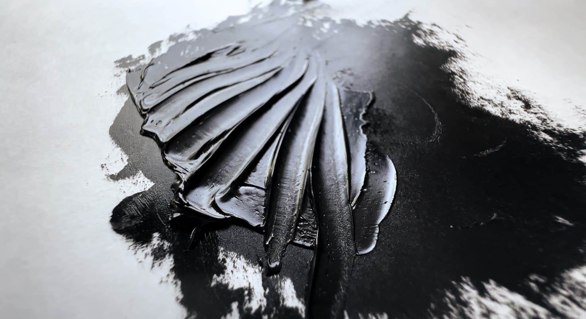 Impasto marks made with a palette knife using Holbein Peach Black oil paint