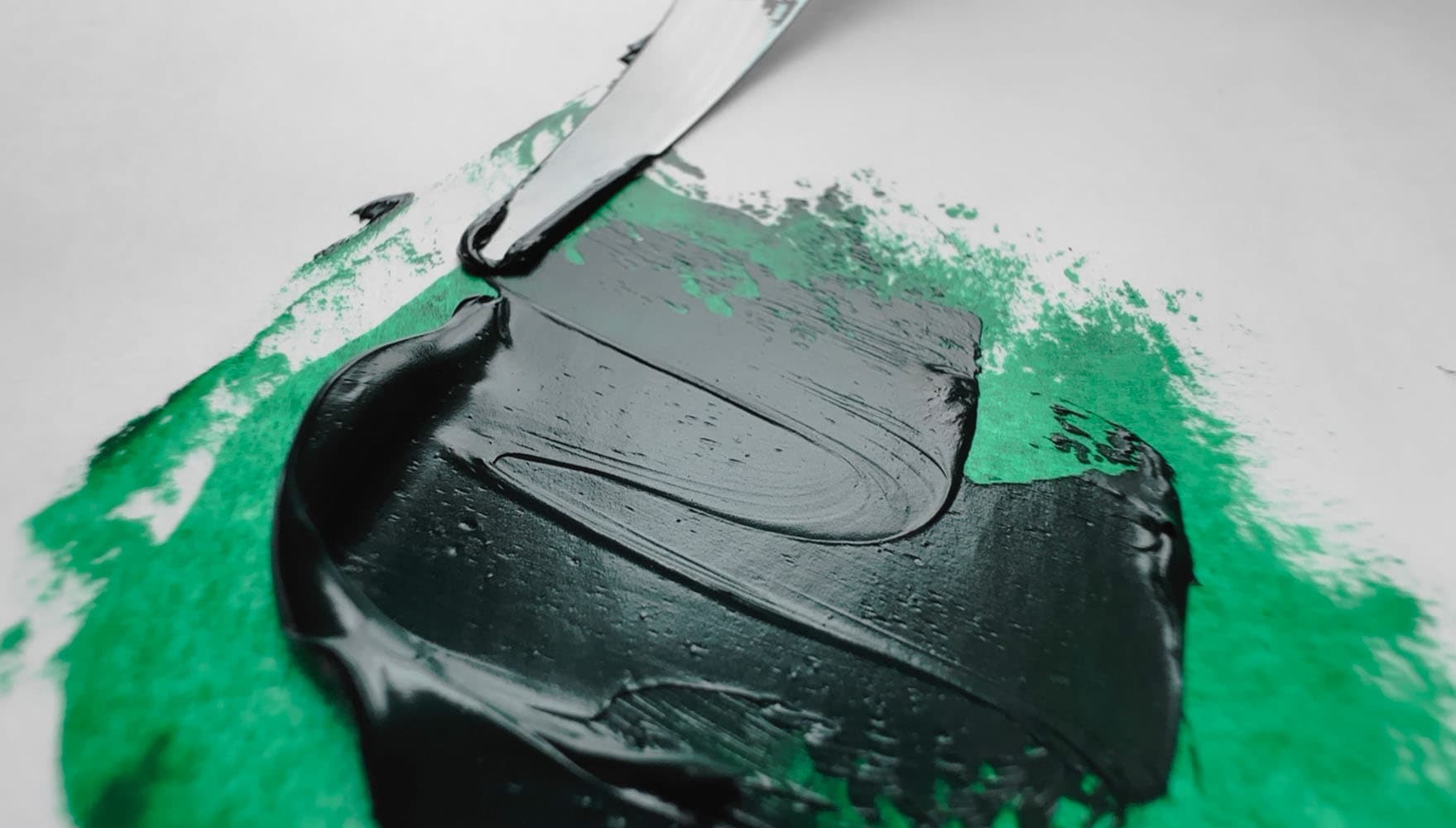 A swoosh of green oil paint