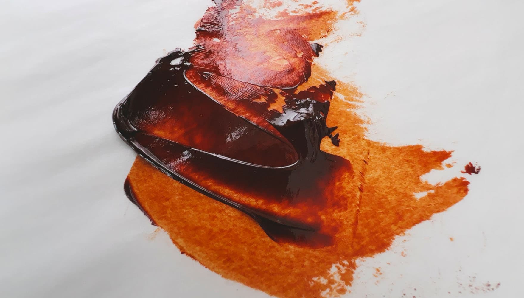 A dash of Quinacridone Orange oil paint. In masstone it is dark brown and in tints a vibrant rust orange color
