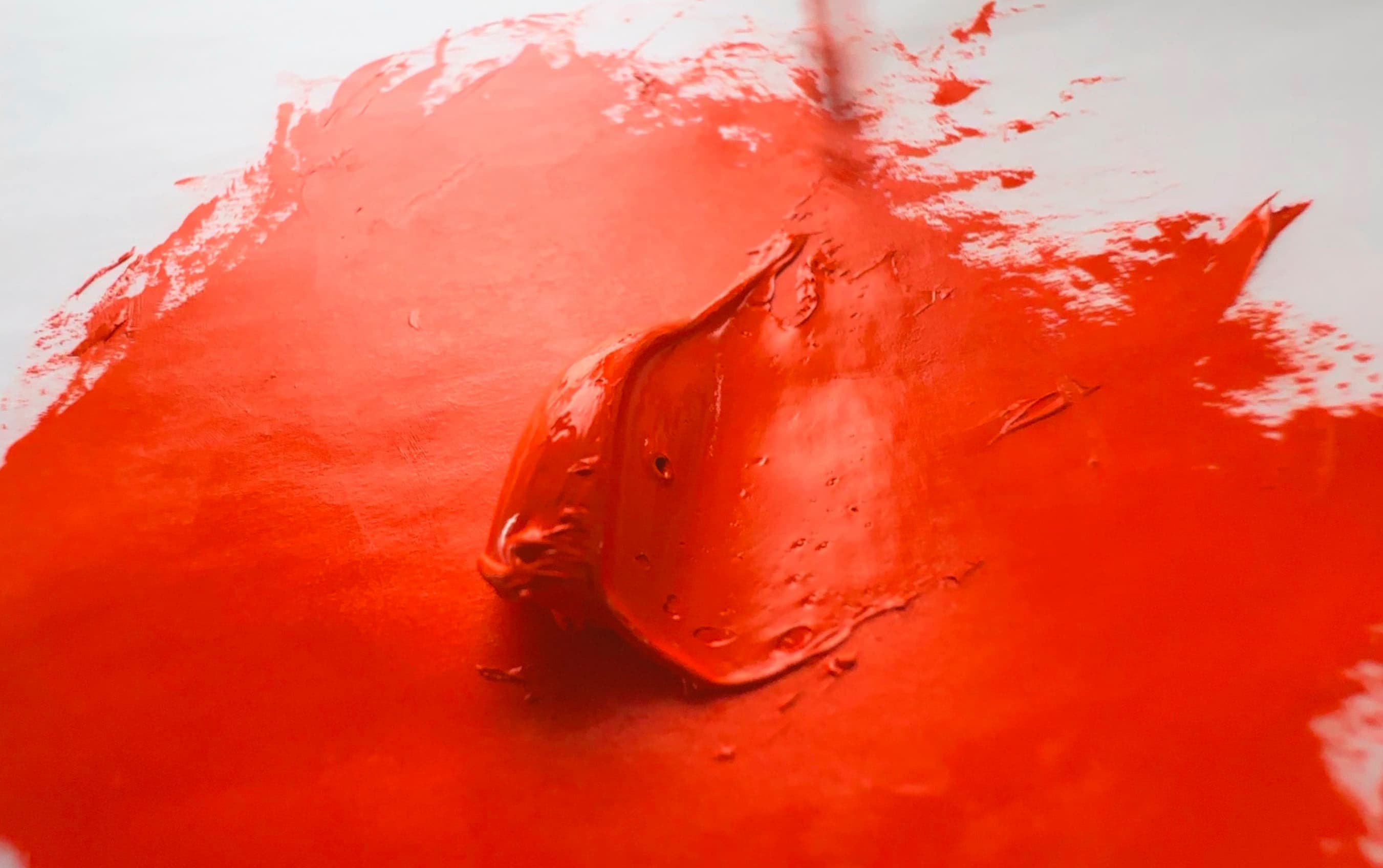 A dollop of orange oil paint