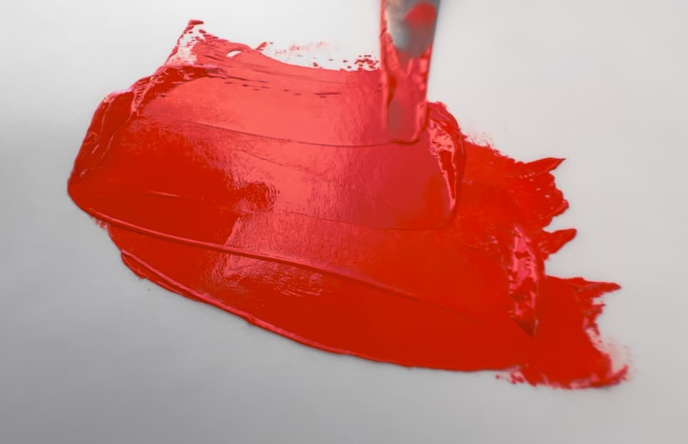 A swoosh of red oil paint made with PR113:1