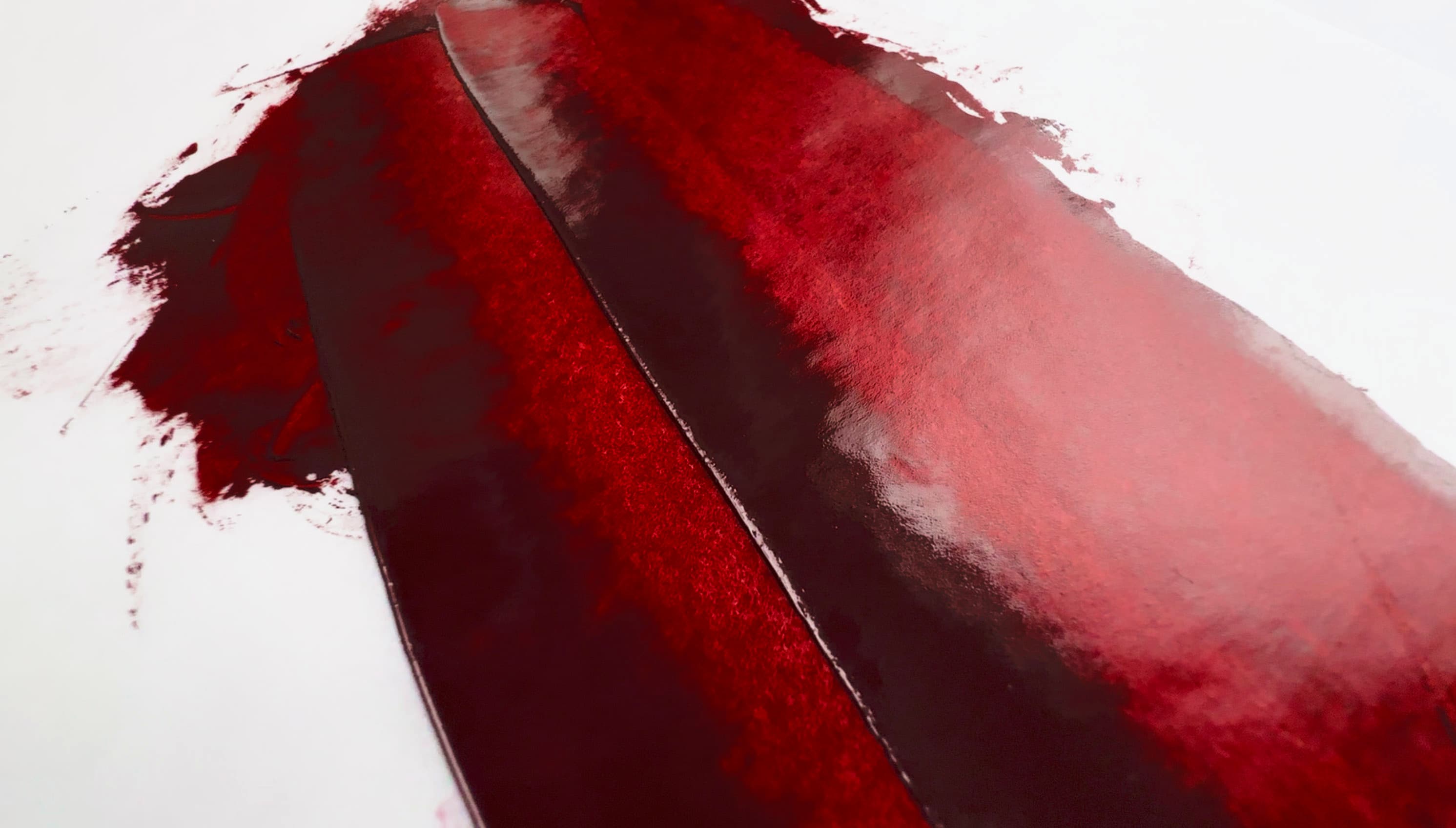 Perylene Maroon spread thinly with a palette knife reveals a deep saturated red