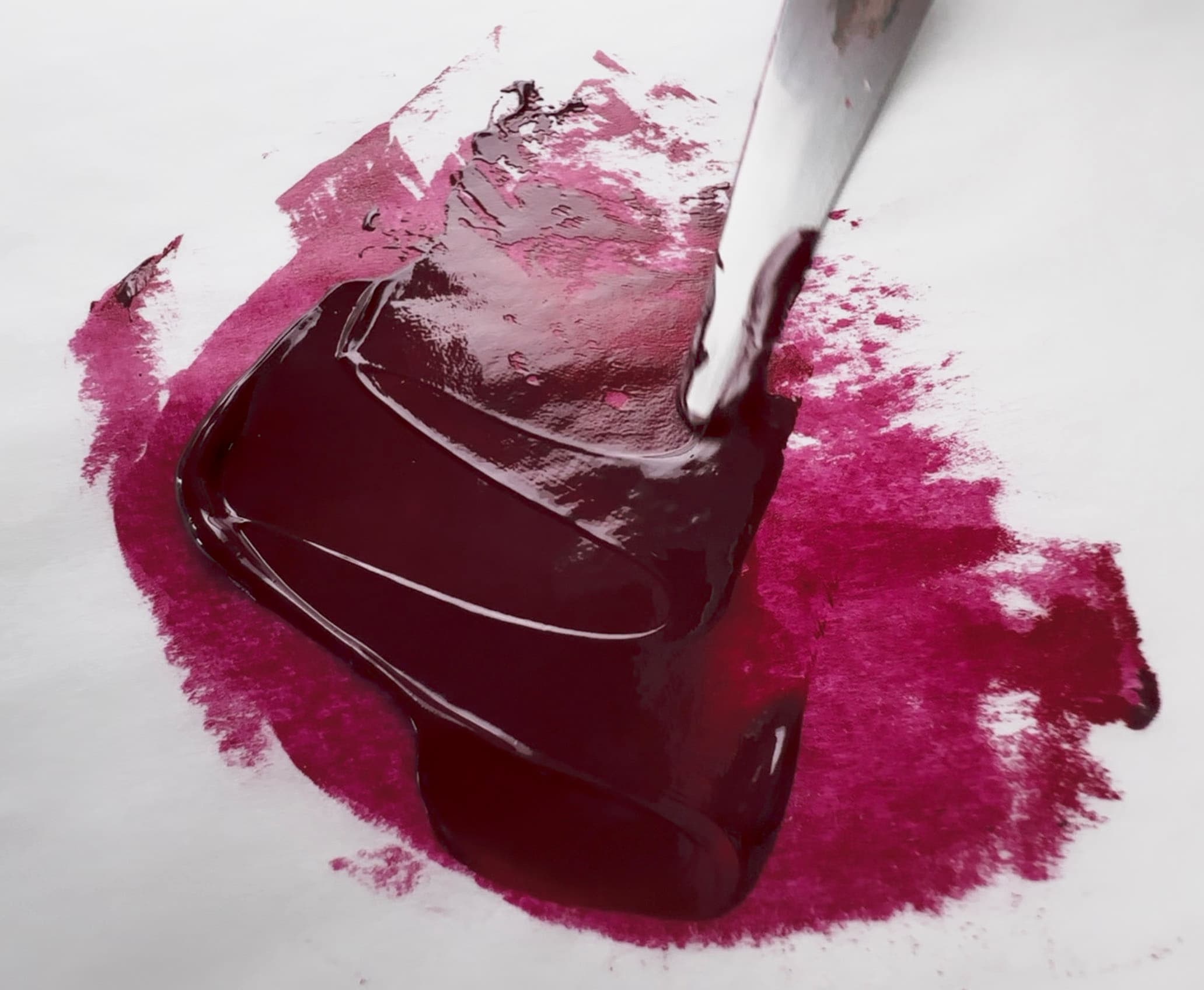 A swatch of Quinacridone Crimson, PR202