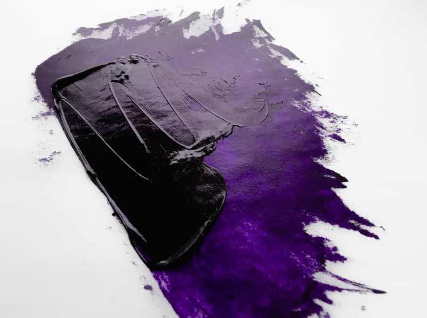 A swatch of oil paint made from PV23. Dioxazine violet is very deep in masstone