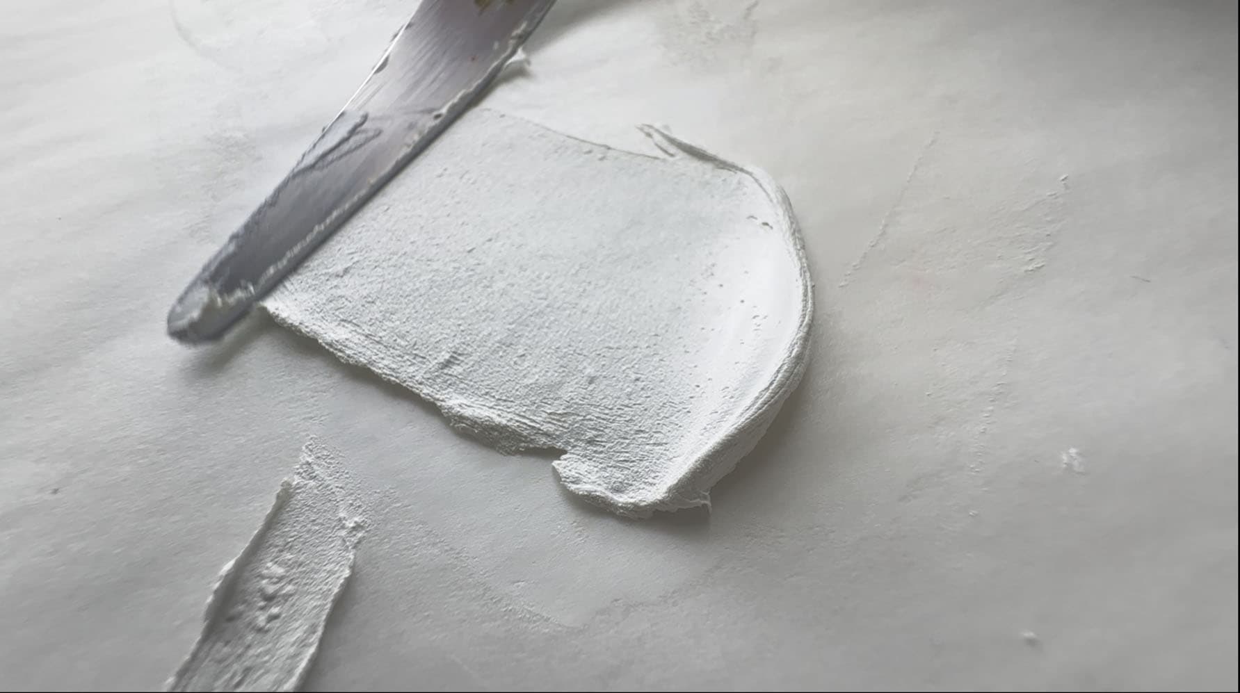 A dollop of vintage zinc white, PW4, with a gritty texture