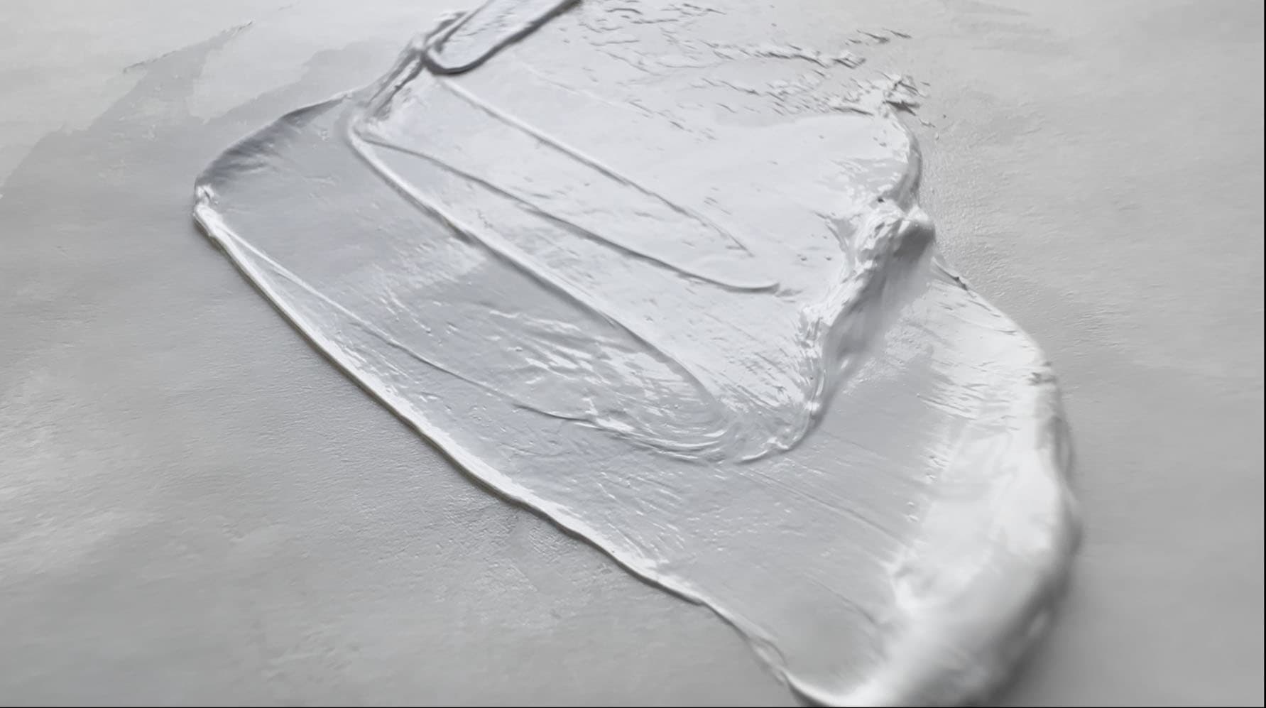 A dollop of white oil paint from a vintage tube of Permalba White