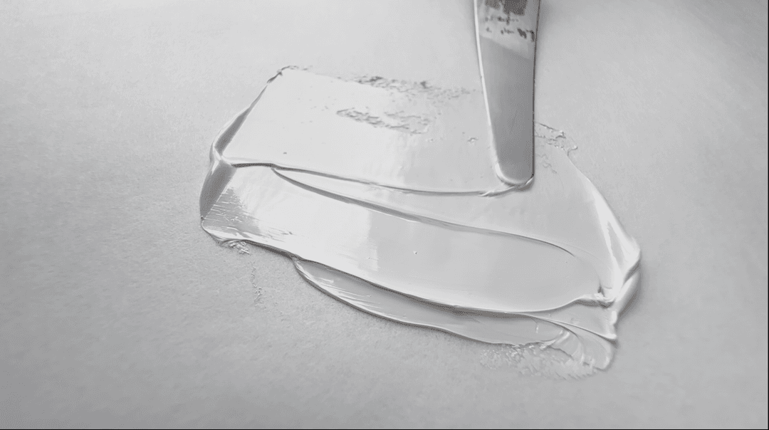 A swoosh of Titanium White artists paint by Old Holland