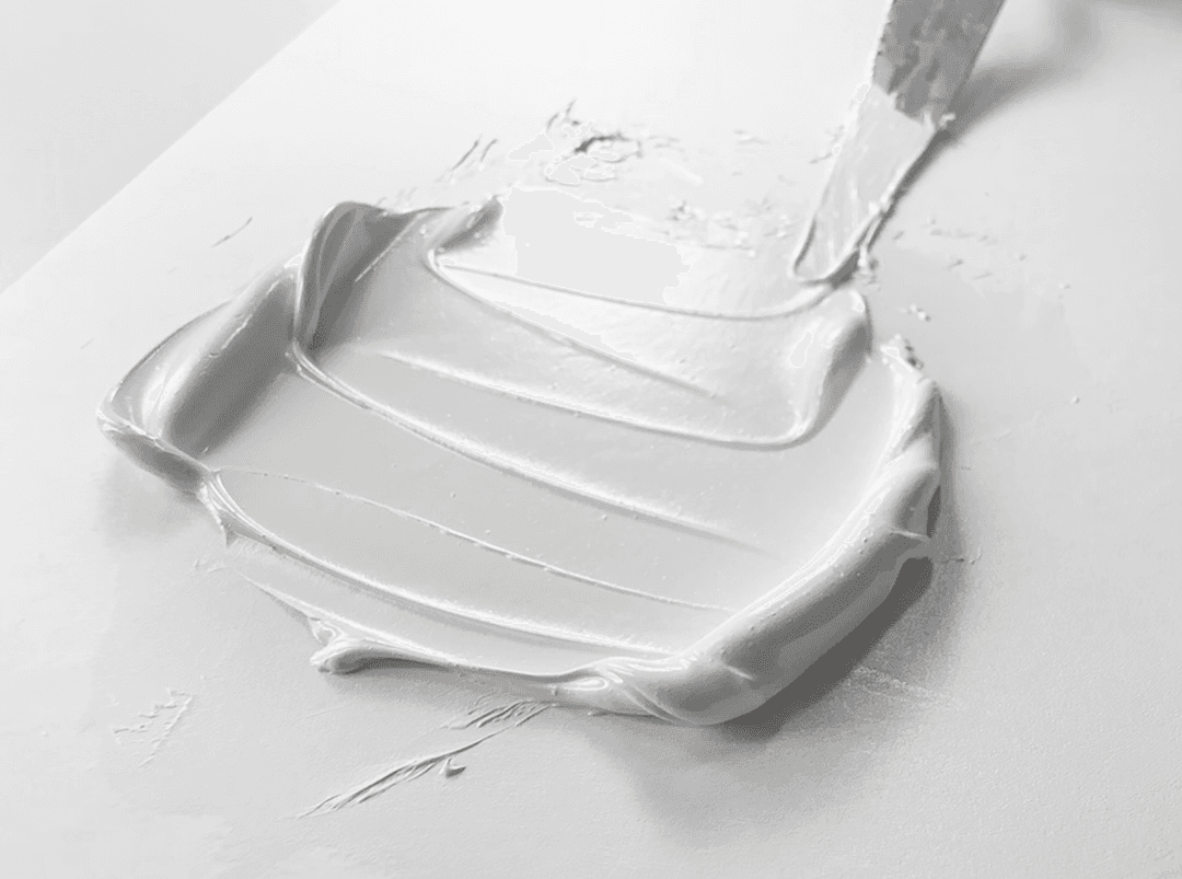 Williamsburg Titanium White PW6 bound in safflower oil spread by a palette knife