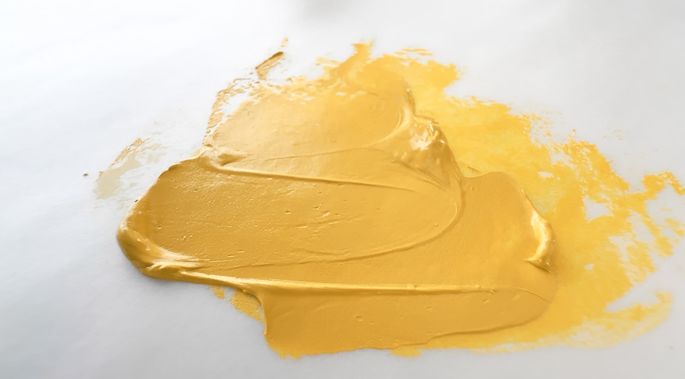 A daub of light brown oil paint